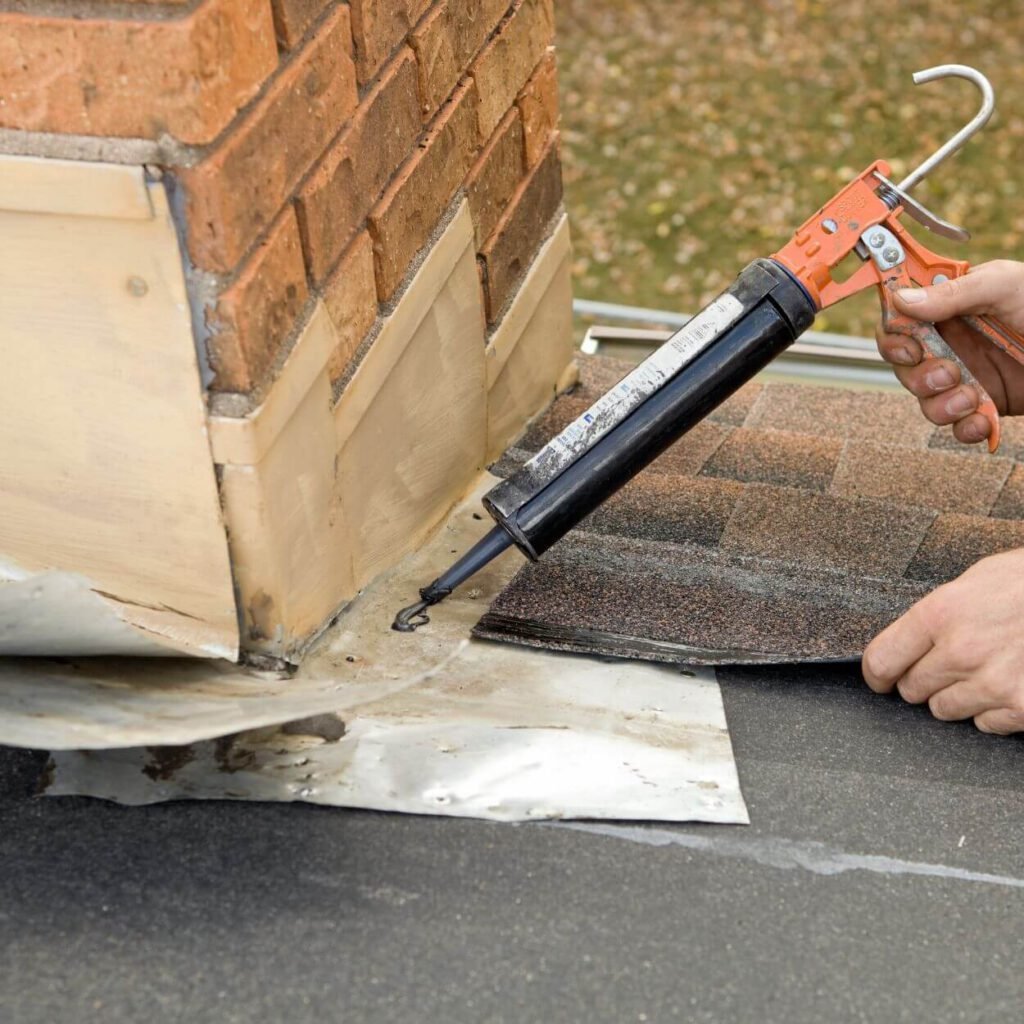 man repairing a chimney